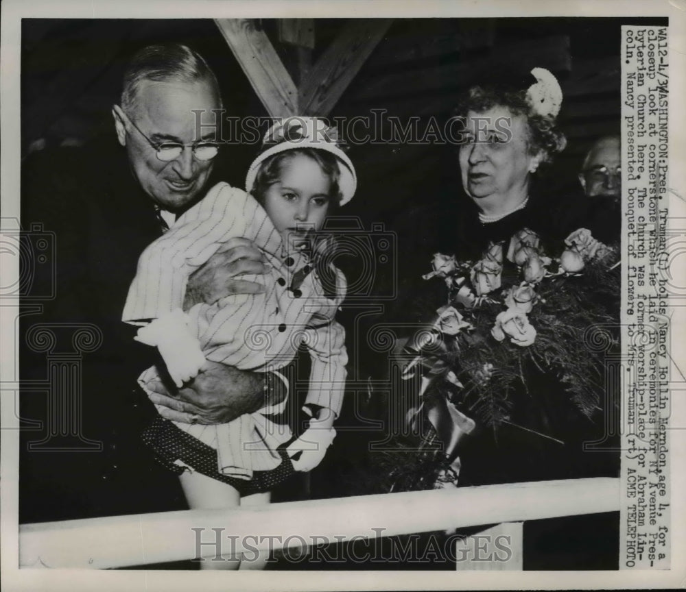 1951 Press Photo Pres. Truman holds Nancy Hollin Herndon to look at cornerstone