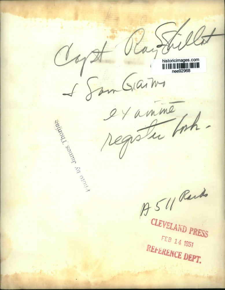 1951 Press Photo Capt Ray Shillat & Sam Gawo examine register book - nee92968