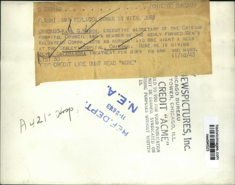 1943 Press Photo Karl Hauch Treats Alyce Salamandra's Burns on Arm and Hand