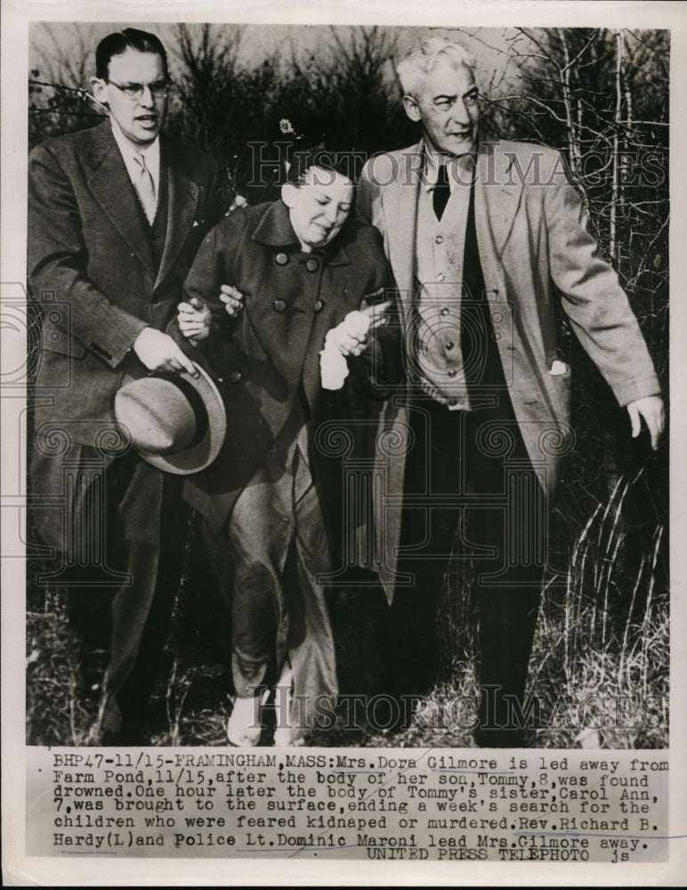 1953 Press Photo Mrs.Dora Gilmore led away from the scene where son drowned