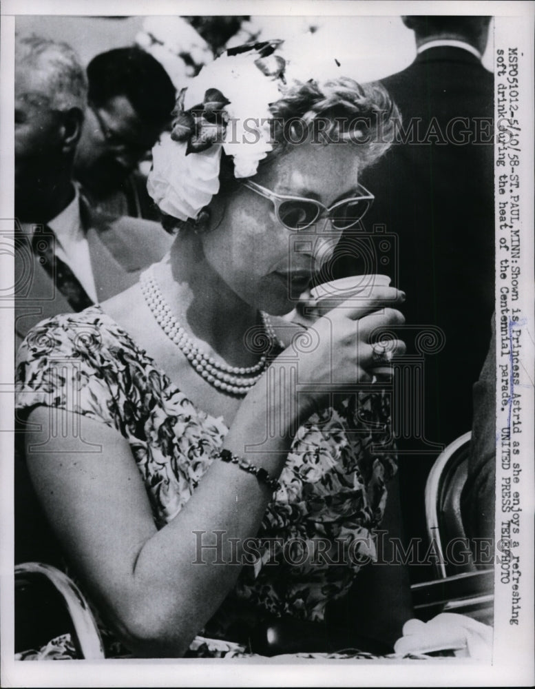 Load image into Gallery viewer, 1958 Press Photo Princess Astrid drink during heat of the Centennial parade

