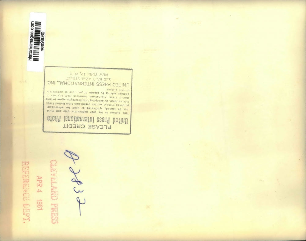 1961 Press Photo Jerry Carmody of Boston confused with the Easter Large Egg