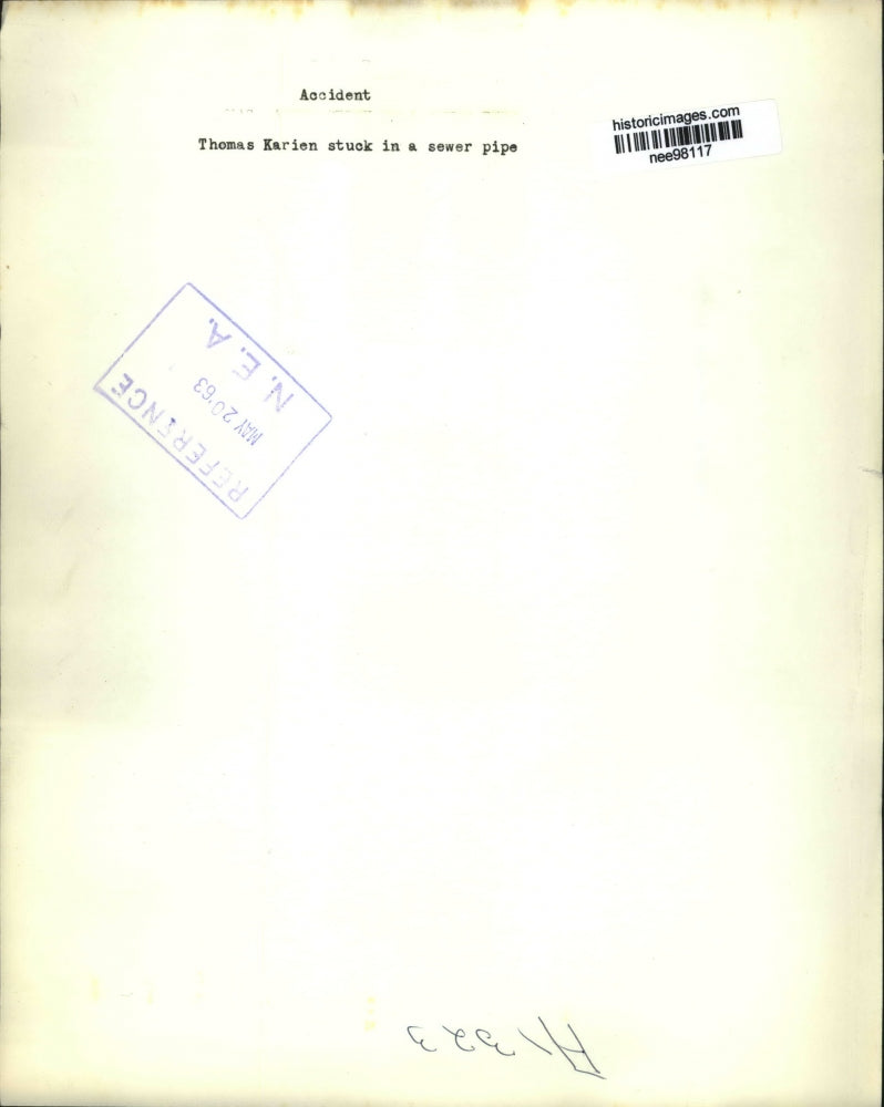 1963 Press Photo Thomas Karien stuck in a sewer pipe - nee98117