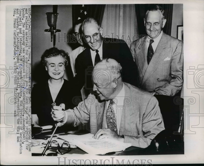 Load image into Gallery viewer, 1953 Press Photo Pres.Eisenhower signs into law a bill at the White House
