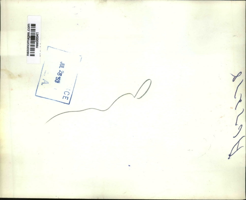 1953 Press Photo Pres.Eisenhower signs into law a bill at the White House