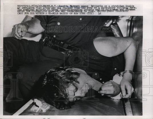 1957 Press Photo Juanita Marrero rescue from the roof of a five story Bldg in NY