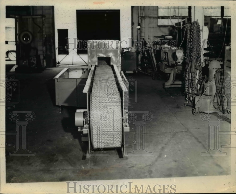 Press Photo Power Pack Conveyor - nef01724