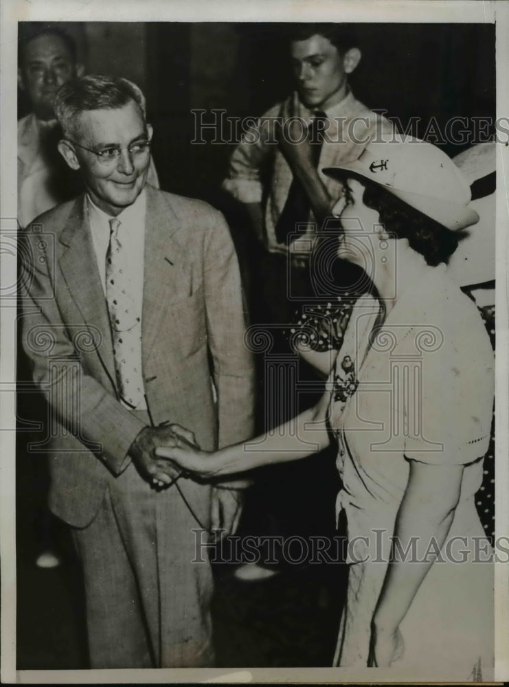 Load image into Gallery viewer, 1937 Press Photo Mrs Miller congratulates husband John on nomination
