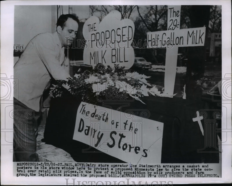 Load image into Gallery viewer, 1955 Press Photo Dairy Store Owner Arranges Minnesota Milk Bill Protest Posters
