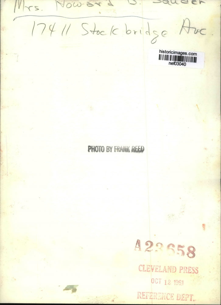 1961 Press Photo Mrs. Howard D. Sauder with Baby & Children's Items - nef03040