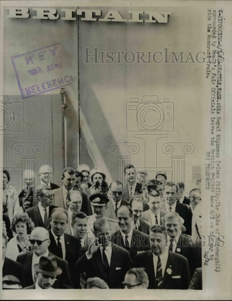 Load image into Gallery viewer, 1962 Press Photo Prince Philip leaves British Exhibition at Worlds Fair
