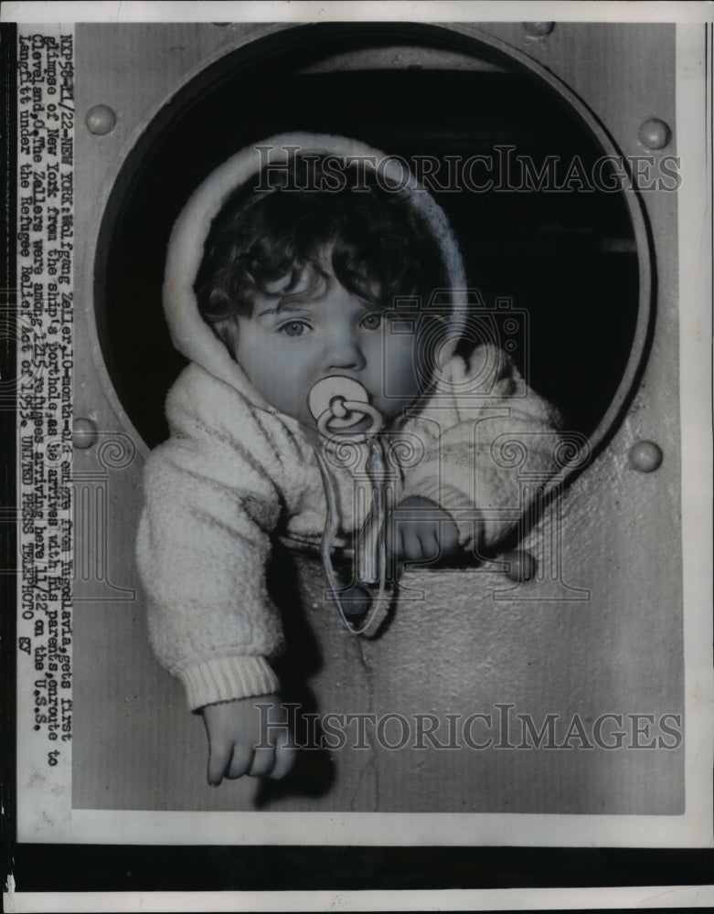 Load image into Gallery viewer, 1955 Press Photo 10 month old Wolfgang Zeller arrives in New York - nef03466
