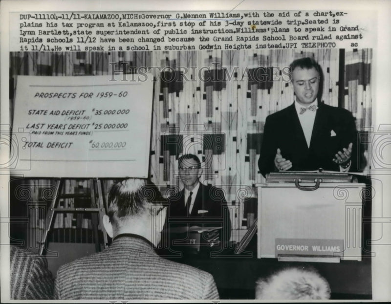 Load image into Gallery viewer, 1959 Press Photo Michigan Gov G Mennen Williams explains tax program - nef03550
