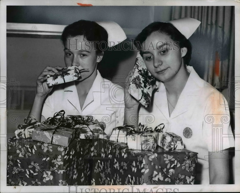 Load image into Gallery viewer, 1956 Press Photo Student nurses Charlotte Strausborger &amp; Janet McGinnis
