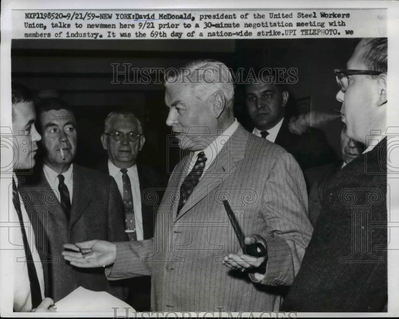 Load image into Gallery viewer, 1959 Press Photo USW President David McDonald talks with reporters in New York
