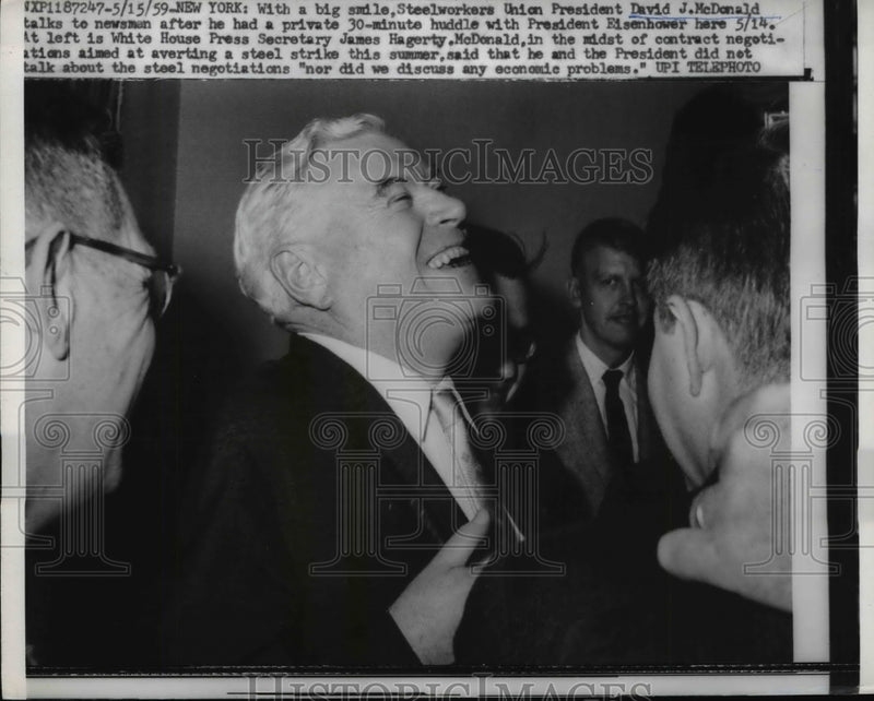 Load image into Gallery viewer, 1959 Press Photo USW President David McDonald talks with reporters after meeting
