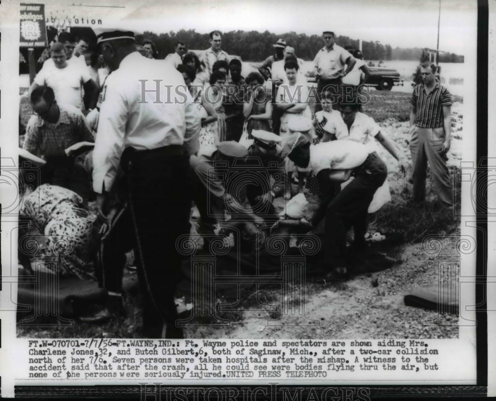 1956 Press Photo Two Car Crash Victims Aided in Fort Wayne, Indiana - nef04603