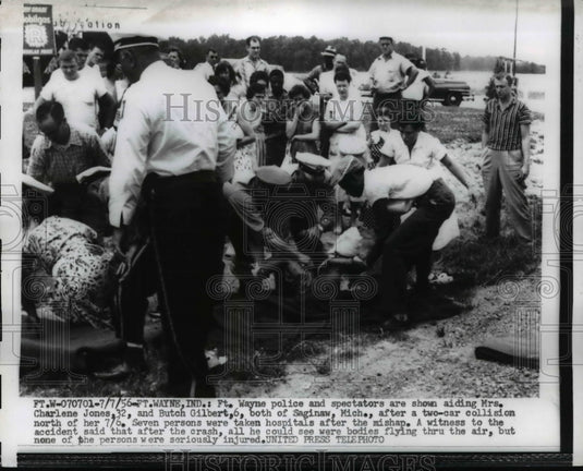 1956 Press Photo Two Car Crash Victims Aided in Fort Wayne, Indiana - nef04603