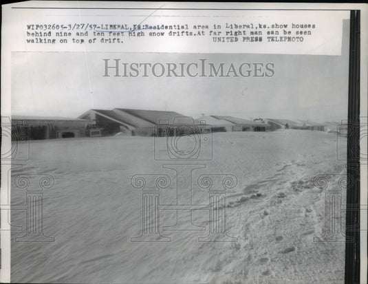 1957 Press Photo Houses Behind 9 and 10-Foot High Snow Drifts, Liberal, Kansas