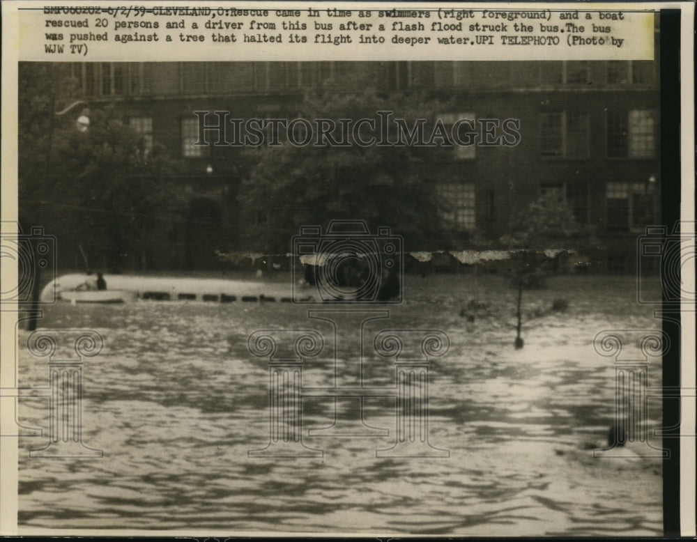 1959 Press Photo Boat Rescues 20 People from Bus During Flash Flood Cleveland