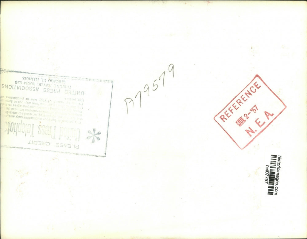 1957 Press Photo Heinrich von Brentano Smells Flowers Given to Frau L. Werhahn