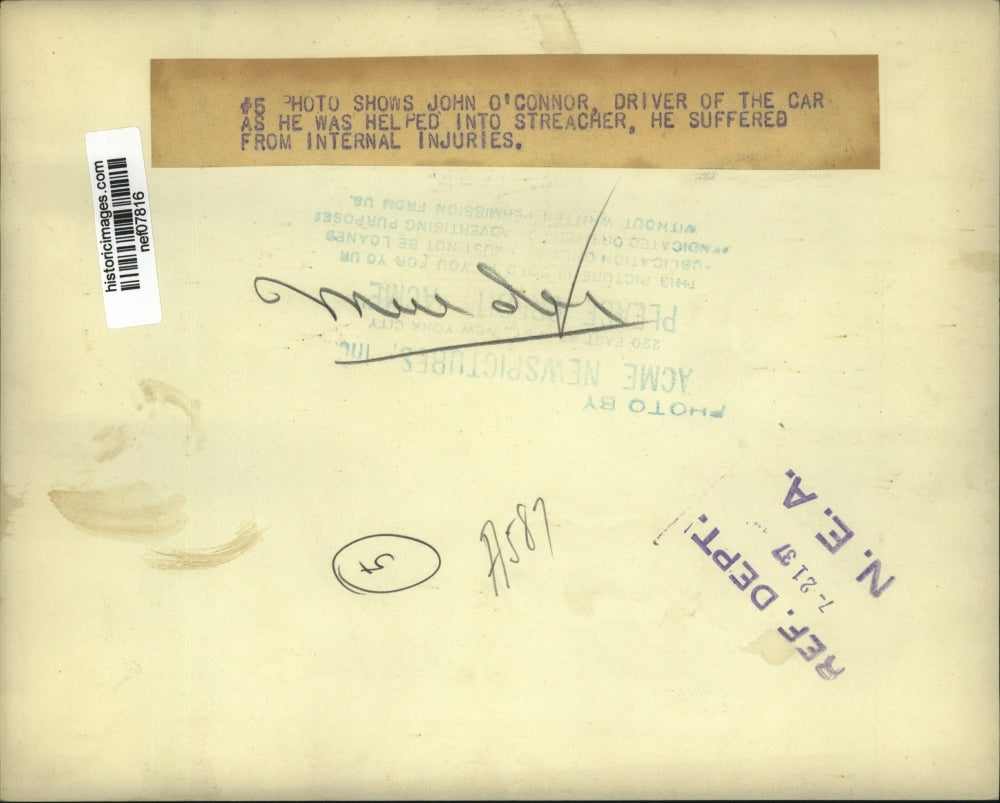 1937 Press Photo John O'Connor Being Helped Onto Stretcher After Car Accident