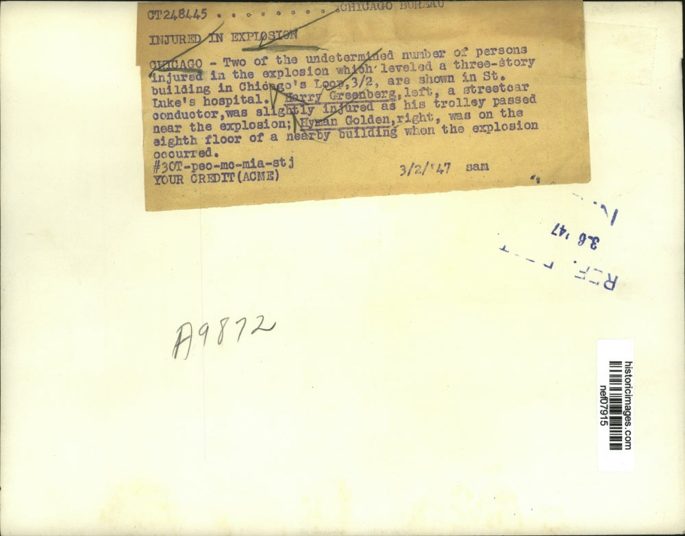 1947 Press Photo Two Persons Shown Injured in Explosion of Three Story Building