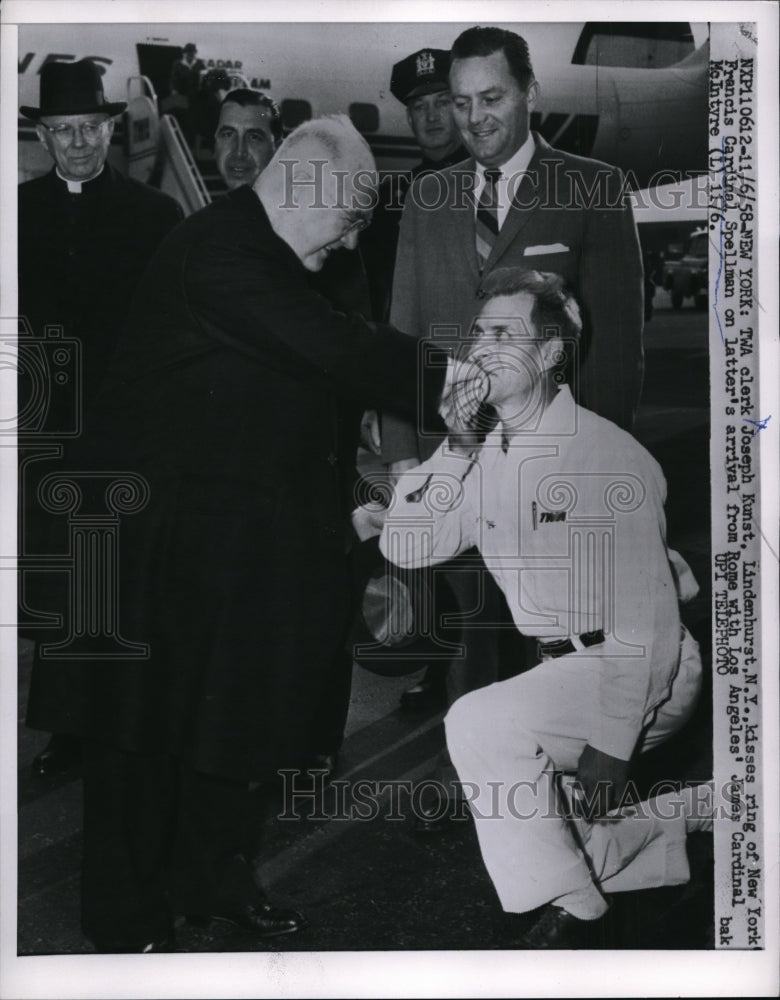 1958 Press Photo Clerk Kisses Ring of Cardinal Spellman at His Arrival From Rome- Historic Images