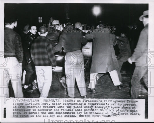 1956 Press Photo Pickets Overturn Car To Prevent Carrying Workers Into The Plant