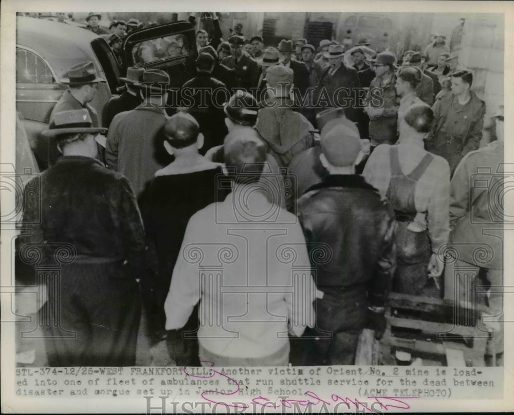 1951 Press Photo Victim of Orient No.2 mine is load into Ambulance - nef10082