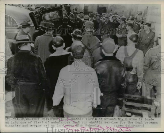 1951 Press Photo Victim of Orient No.2 mine is load into Ambulance - nef10082