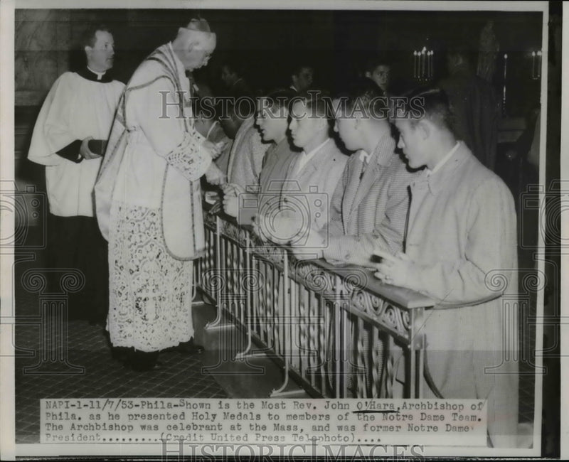 Load image into Gallery viewer, 1953 Press Photo Rev O'Hara Presents Holy Medals to Members of Notre Dame Team
