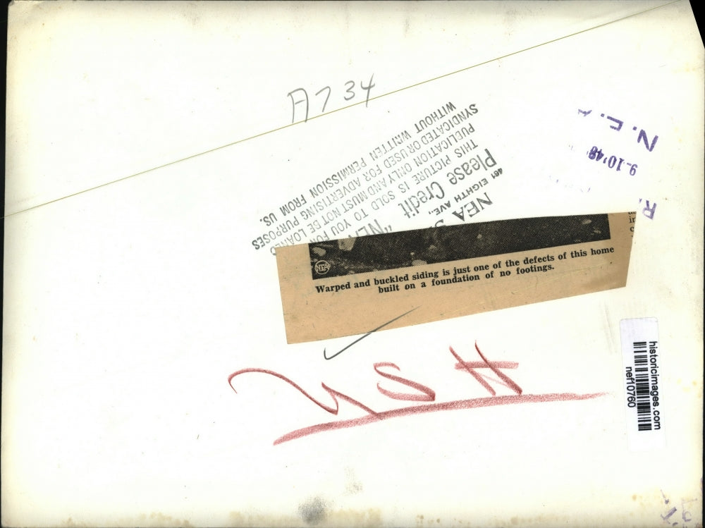 1948 Press Photo Warped and Buckled Siding Are Defects Of This Home - nef10760