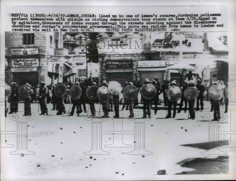 Load image into Gallery viewer, 1957 Press Photo Jordanian Policemen lined up with shields for Rioters
