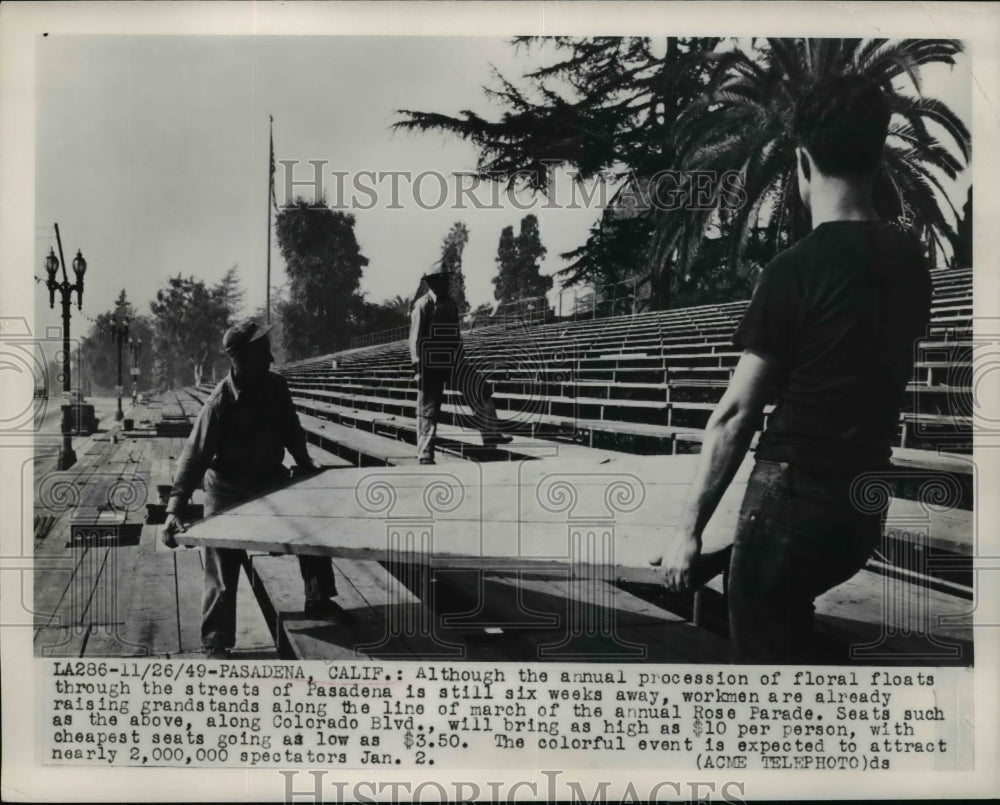 1949 Press Photo Workmen raising grandstand for Annual Rose Parade - nef12526