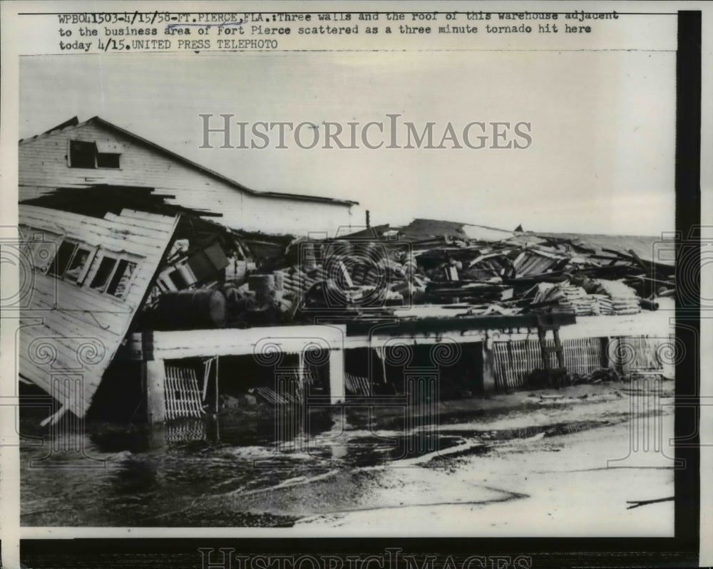 1958 Press Photo Warehouse Scattered As A Three Minute Tornado Hit - nef13232