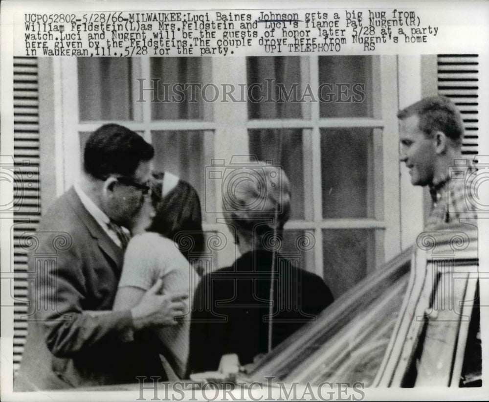 1966 Press Photo Luci Johnson Gets Hug From William Feldstein - nef14180