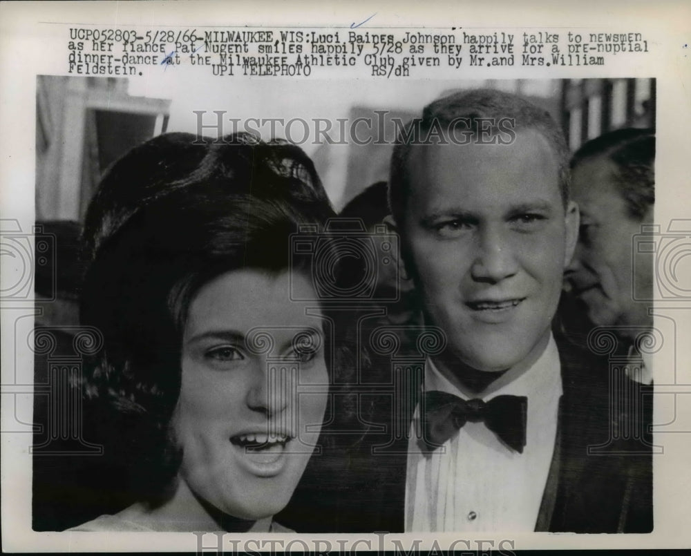 1966 Press Photo Luci Johnson talks to newsmen as her fiance Pat Nugent smiles
