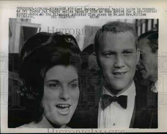 1966 Press Photo Luci Johnson talks to newsmen as her fiance Pat Nugent smiles