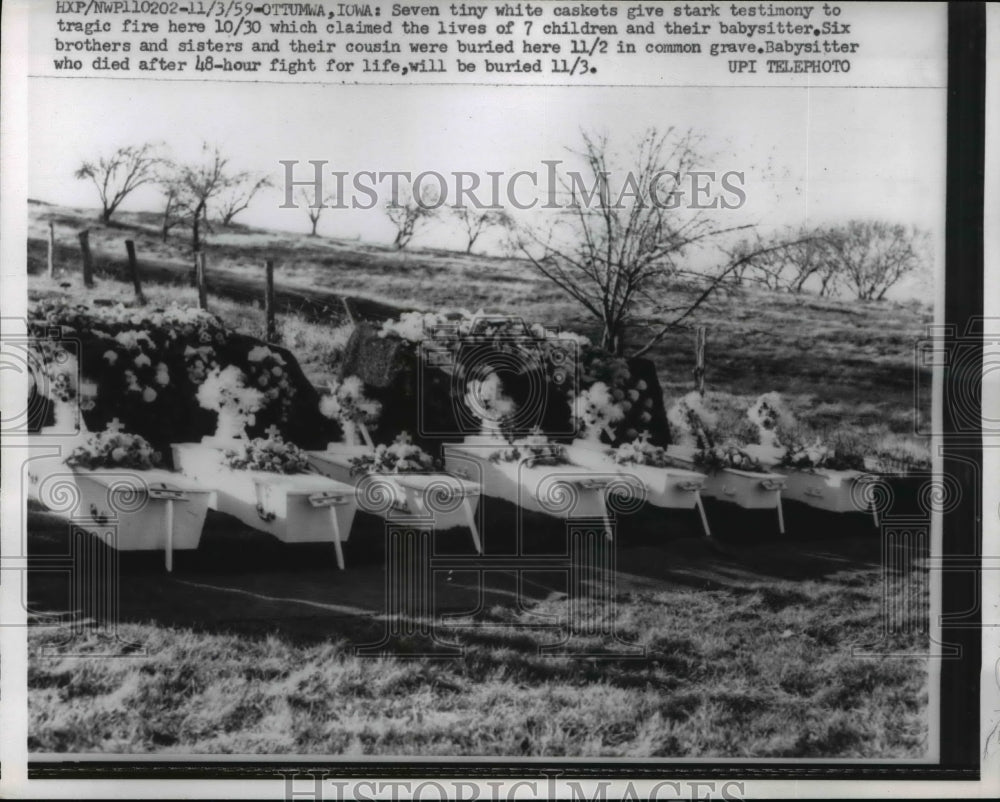 1959 Press Photo Seven White Caskets Give Stark Testimony to Tragic Fire in Iowa