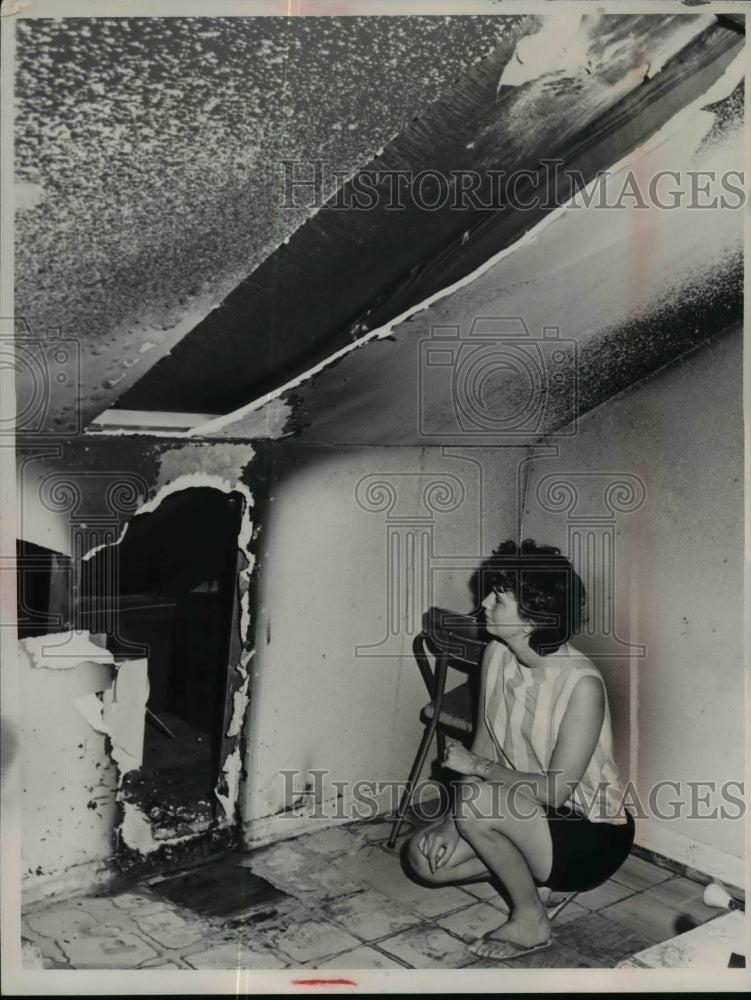 1965 Press Photo Woman Viewing Home Fire Damage - nef15474
