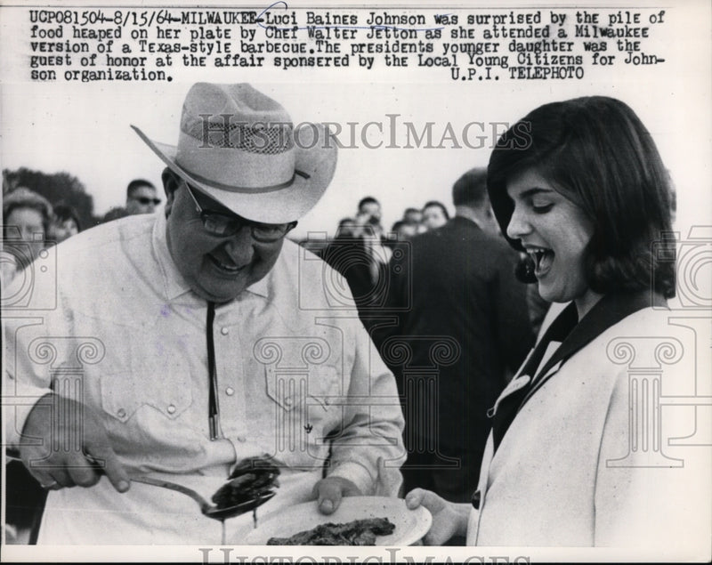 Load image into Gallery viewer, 1965 Press Photo Luci Johnson Surprised by Pile of Food Heaped On her Plate
