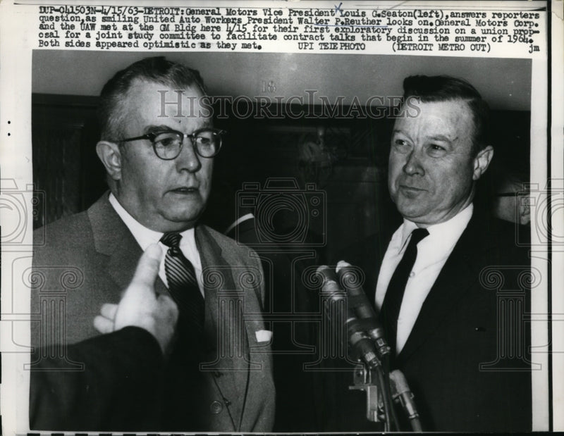 Load image into Gallery viewer, 1963 Press Photo Louis Seaton Answers Questions as Walter Reuther Looks On
