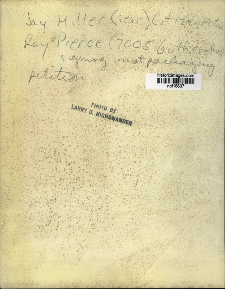 Press Photo Man Signing Meat Packaging Petition, Ohio - nef16607