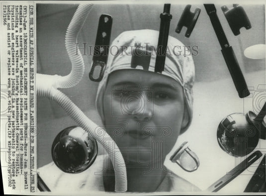 1966 Press Photo Nurse Jean Boswell Examines Assortment of Mechanical Parts