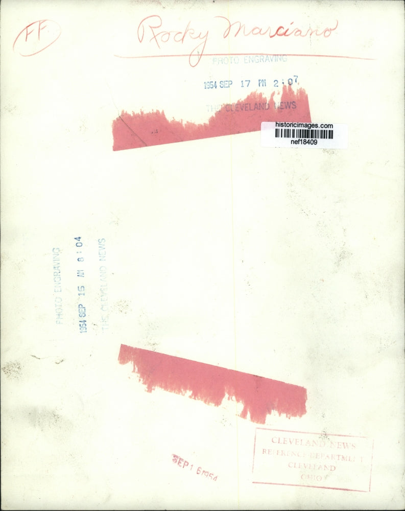 1954 Press Photo Rocky Marciano, heavyweight titleholder leaves Madison Square