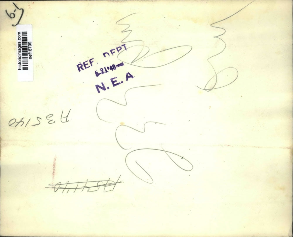 1948 Press Photo Sen.Olin D.Johnson holds pictures of Gen. Dwight Eisenhower