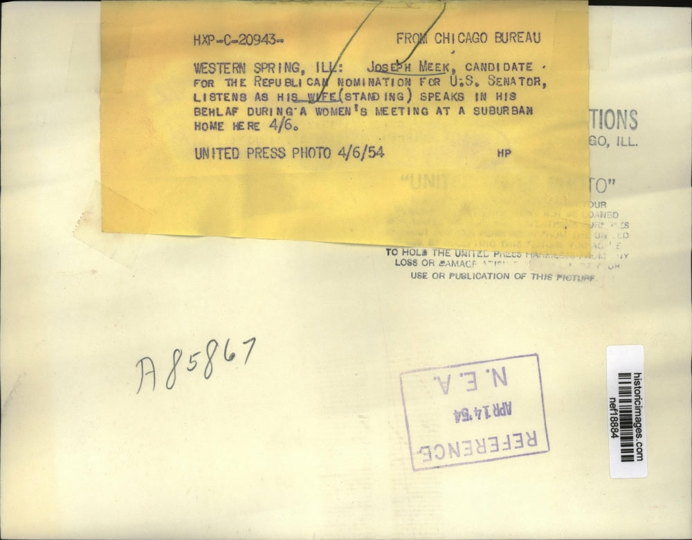 1954 Press Photo Joseph Meek Listens as His Wife Speaks On His Behalf