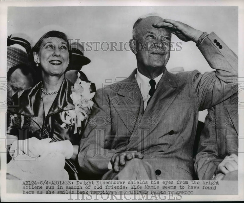 Load image into Gallery viewer, 1957 Press Photo Dwight Eisenhower Shields His Eyes From the Abilene Bright Sun
