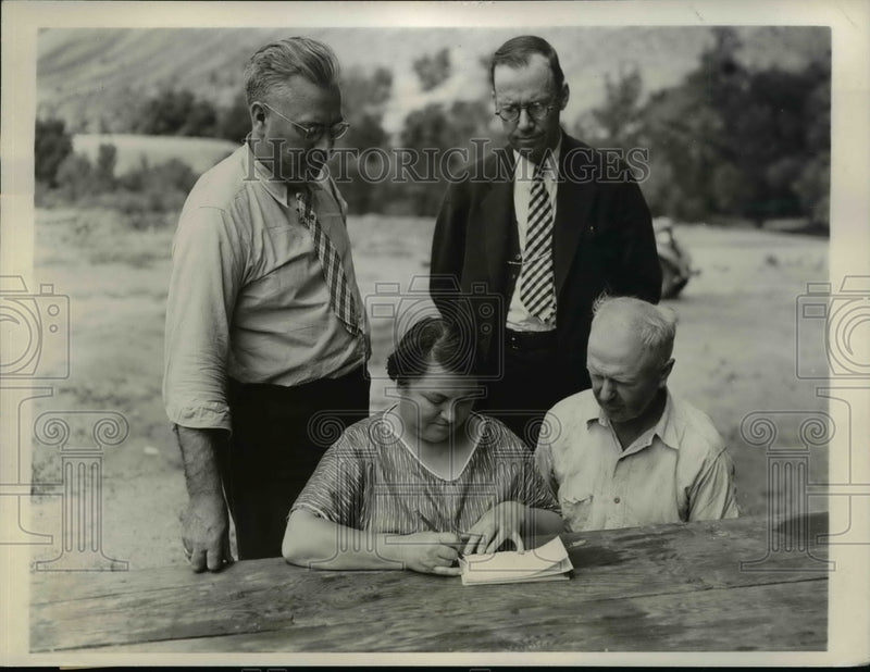 Load image into Gallery viewer, 1936 Press Photo Marie Eisenmenger Signs Affadavit in Missing Joseph Crater Case
